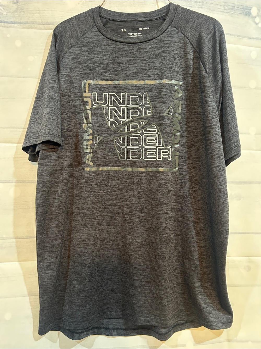 Under Armour Men's Heather Charcoal Performance Tee with Logo Graphic